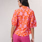 Blusa floreale con colletto e maniche corte
