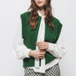 Gilet in maglia rasata con girocollo