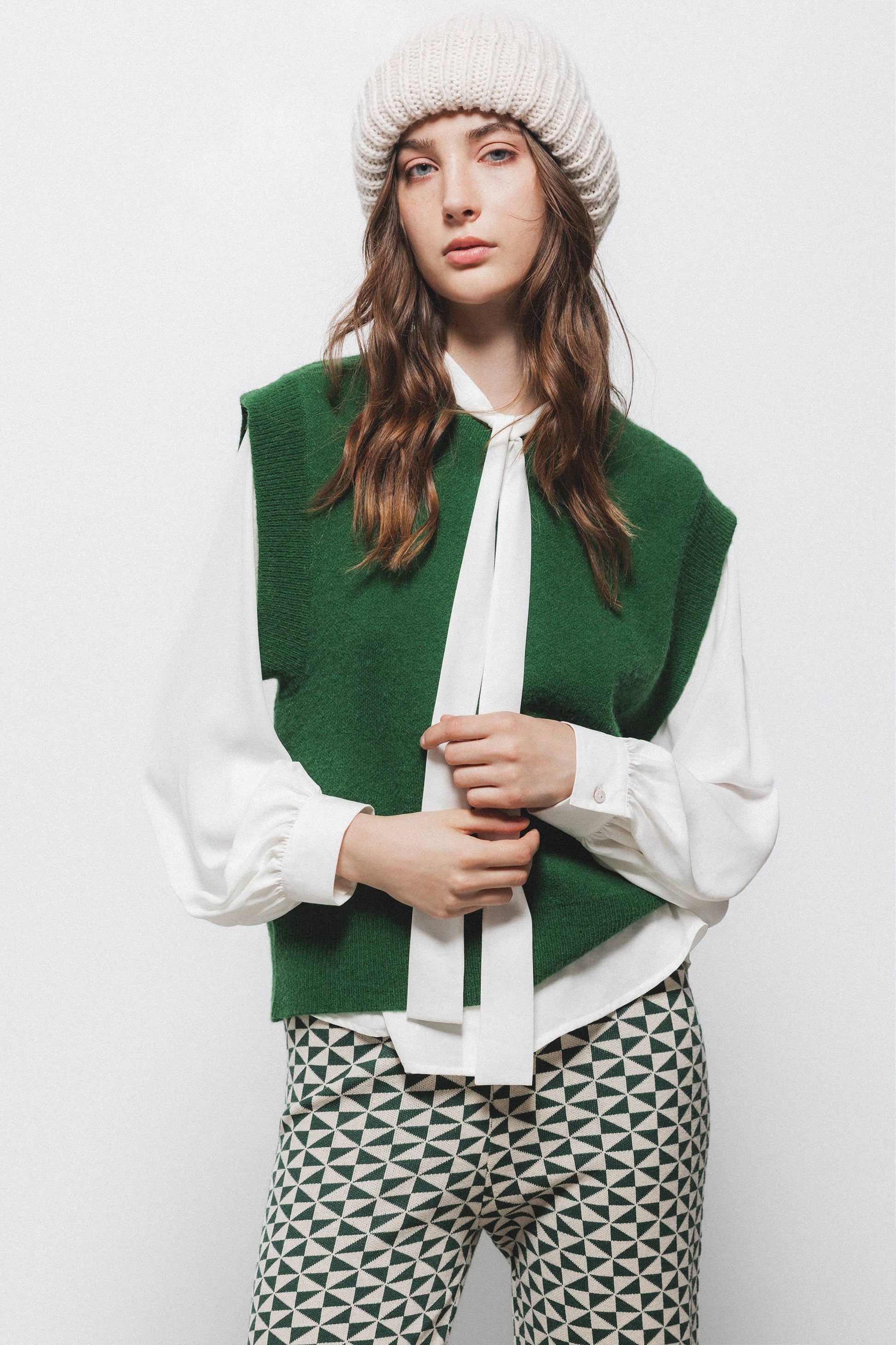 Gilet in maglia rasata con girocollo