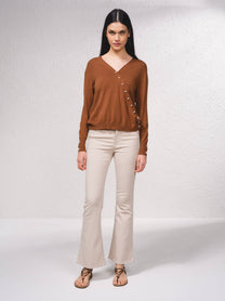 Maglione cache-cœur in maglia fine con perle