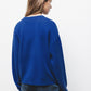 Cardigan in maglia blu con scollo a V