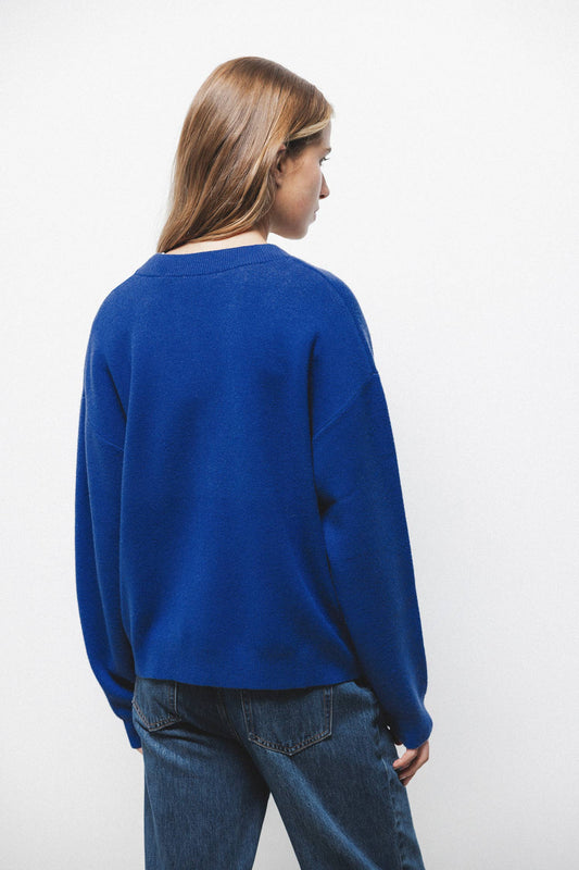 Cardigan in maglia blu con scollo a V
