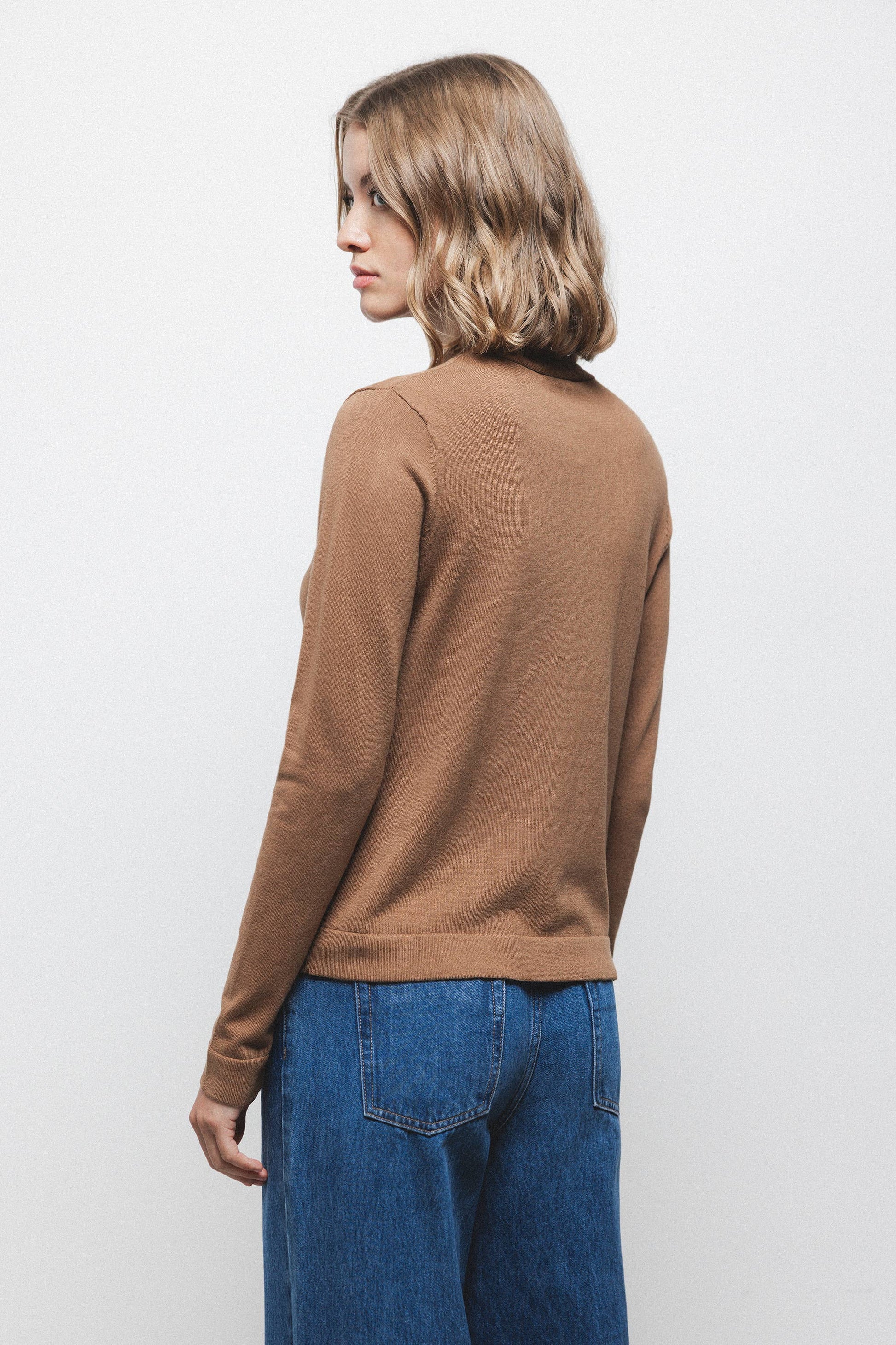Maglione in maglia rasata con fiocco