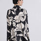 Blusa fluida con fiocco e stampa grafica