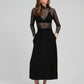 Top in pizzo trasparente nero a maniche lunghe con collo alto