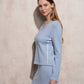 Maglione in maglia con scollo a V e profili a contrasto