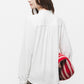 Blusa con fiocco al collo