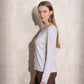 Maglione in maglia scintillante con profilo ondulato