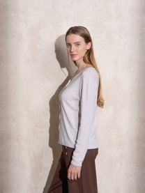 Maglione in maglia scintillante con profilo ondulato