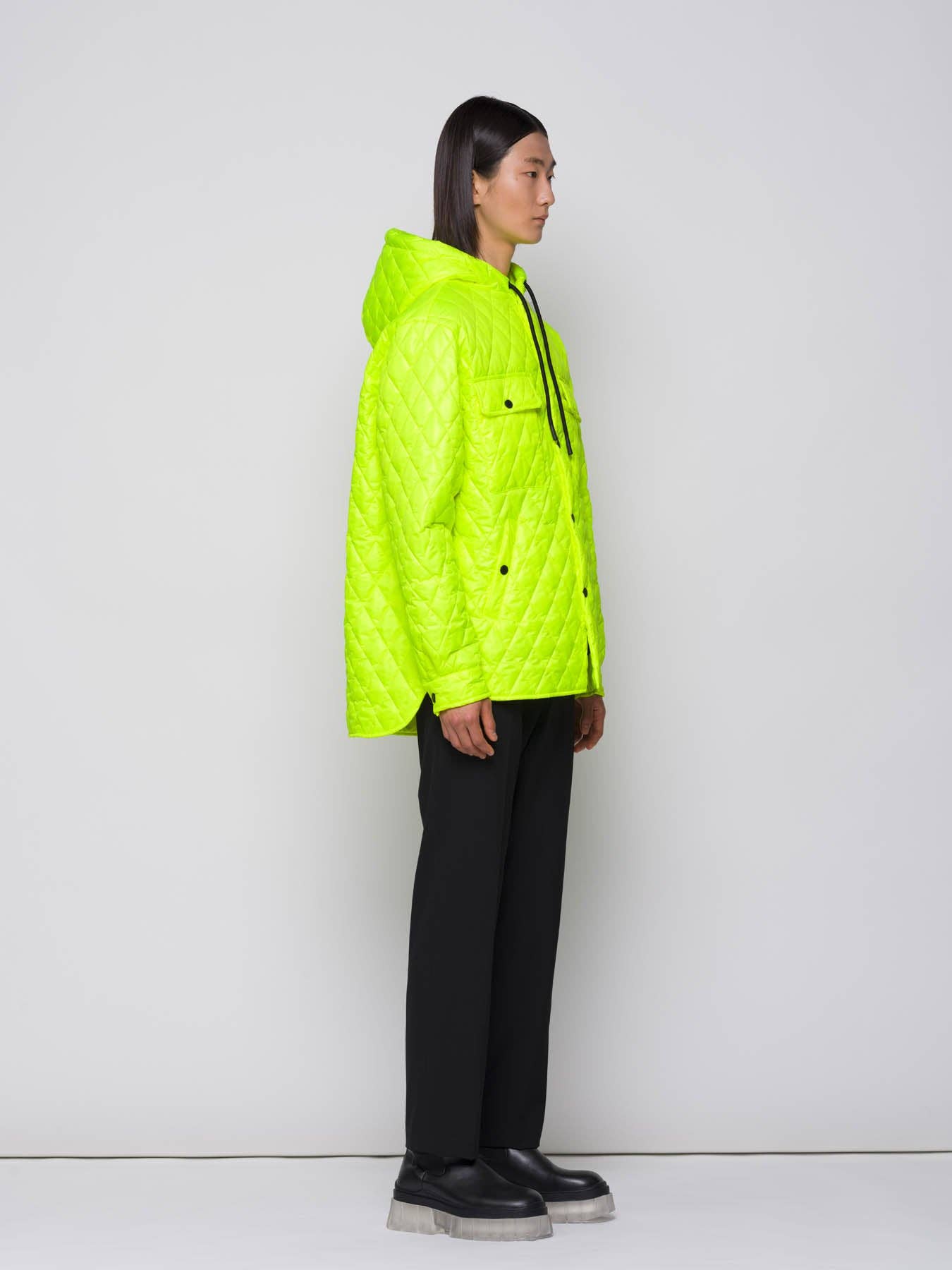 Giacca trapuntata a rombi con cappuccio fluo