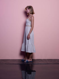 Abito midi in lurex con spalline e balza