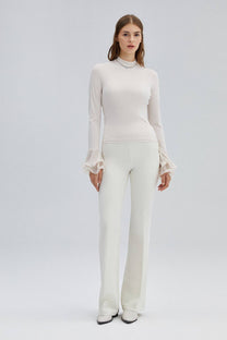 Blusa in maglia ecrù con maniche a balze in chiffon
