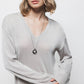 Maglione a maglia rasata con dettagli metallici