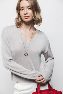 Maglione a maglia rasata con dettagli metallici