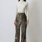 Pantaloni cargo a zampa in cotone leopardato