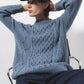 Maglione in maglia strutturata con trecce