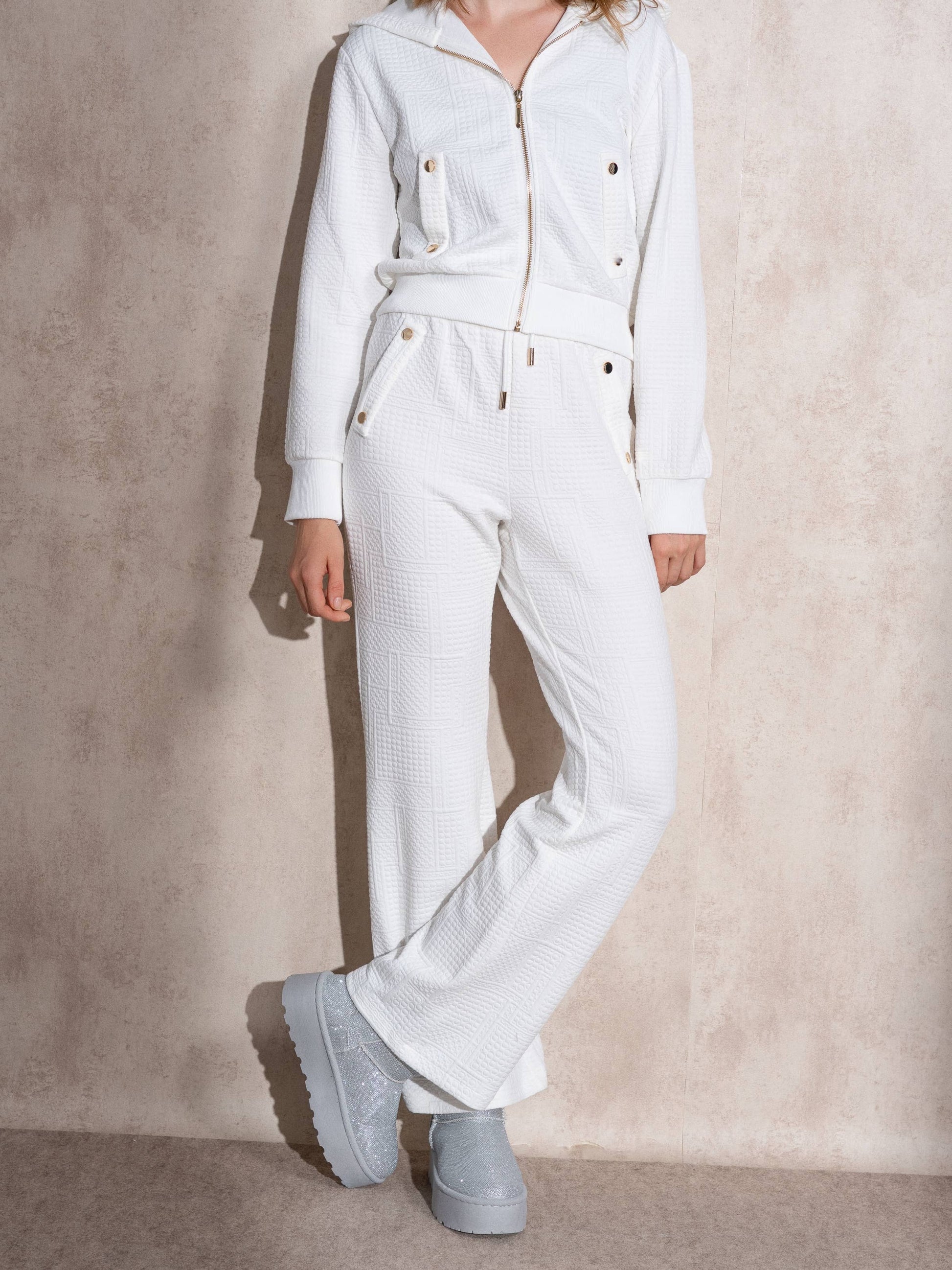 Pantaloni jogger in tessuto matelassé con coulisse
