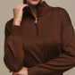 Maglione polo in maglia con zip e micro strass