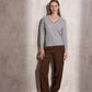Maglione in maglia di lurex con scollo a V