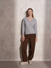 Maglione in maglia di lurex con scollo a V