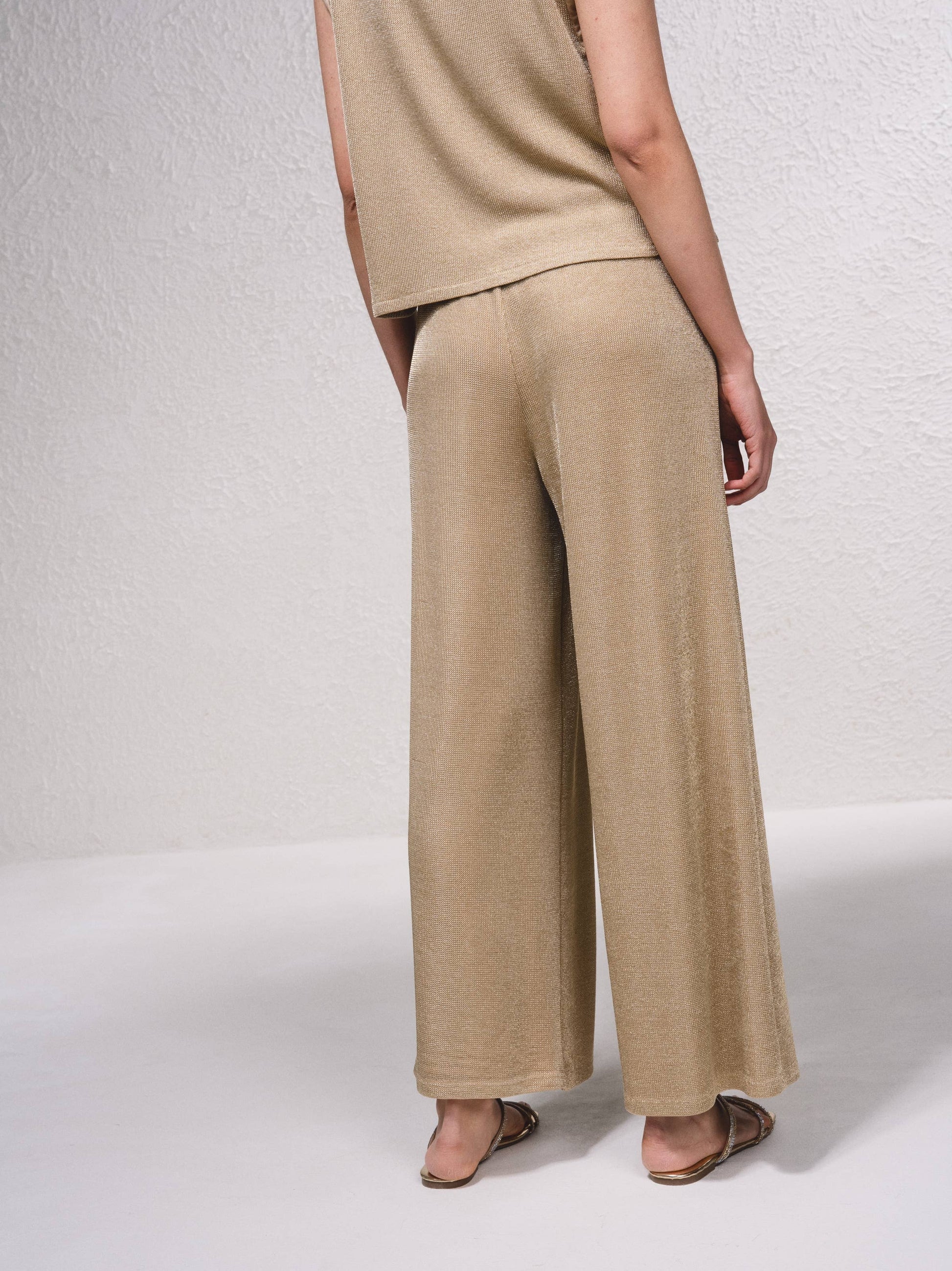 Pantaloni palazzo in lurex con coulisse