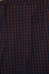 Pantaloni aderenti a quadri in cotone