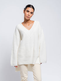 Maglione tunica da donna con scollo a V