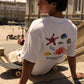 T-shirt oversize “Extinction is Forever” in cotone biologico