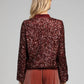 Blouson con paillettes color vino
