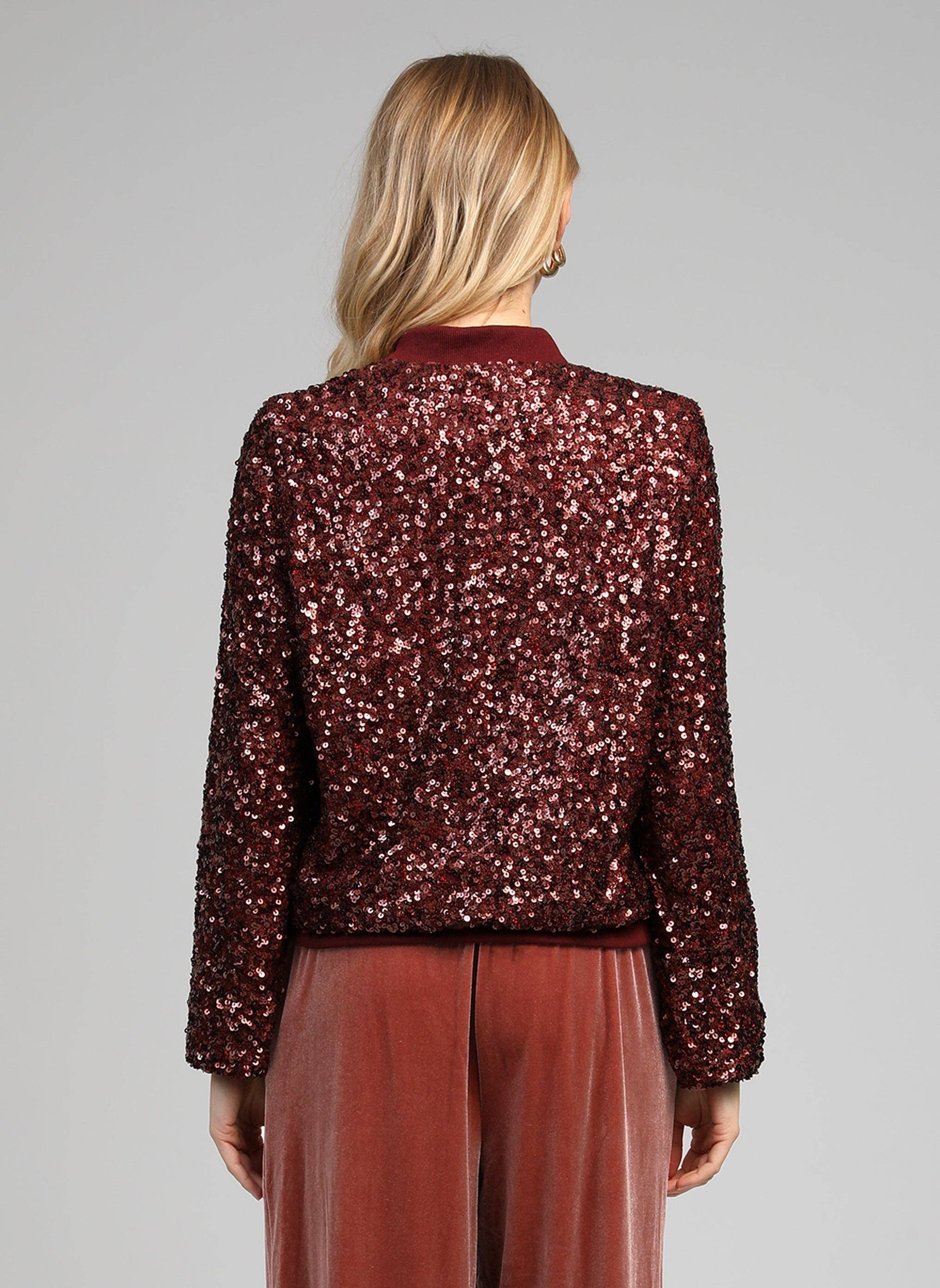Blouson con paillettes color vino