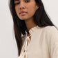 Blusa Tichka in cotone con laccetti e maniche a volant