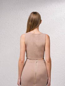 Top corto in maglia a costine con bottoni