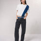 Jeans bicolore in denim con tasche zip