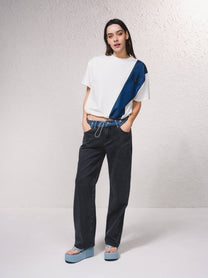 Jeans bicolore in denim con tasche zip