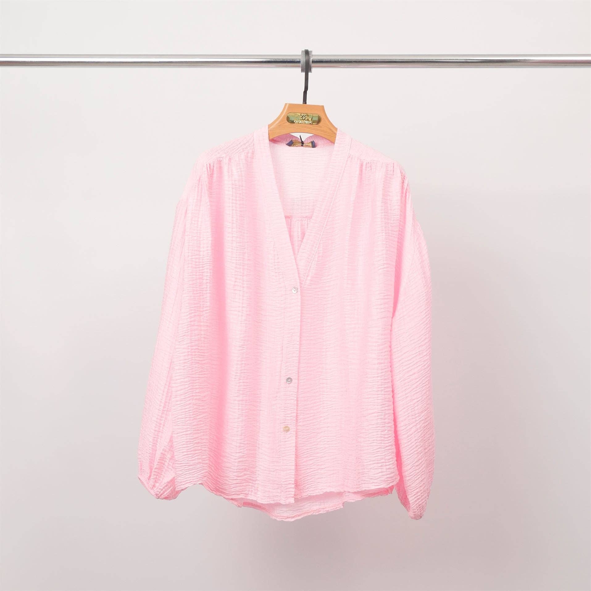 Blusa testurizzata con bottoni e scollo a V