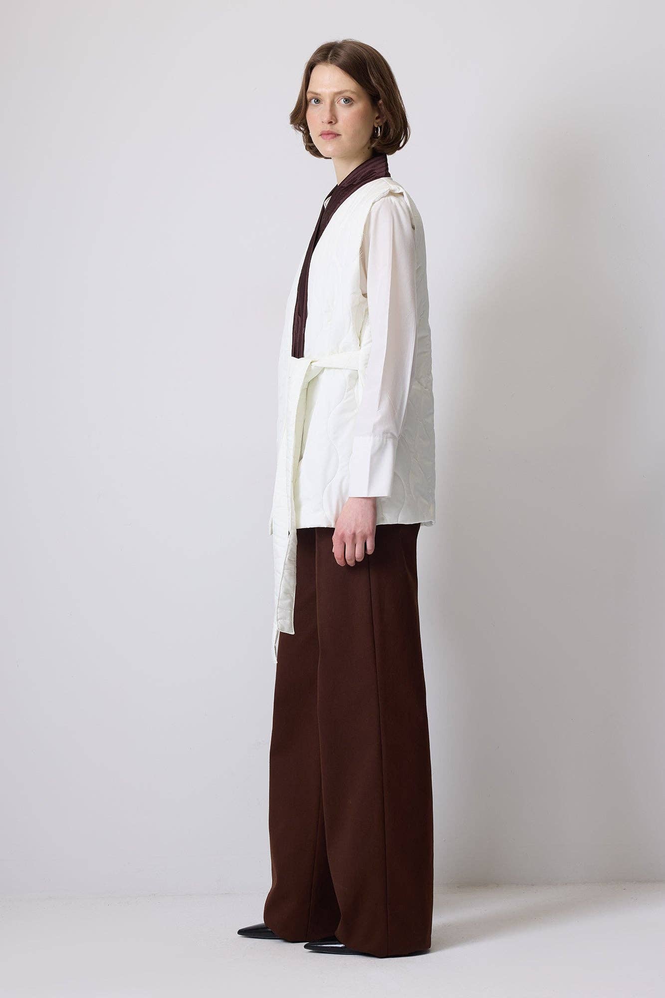 Gilet trapuntato con laccio laterale