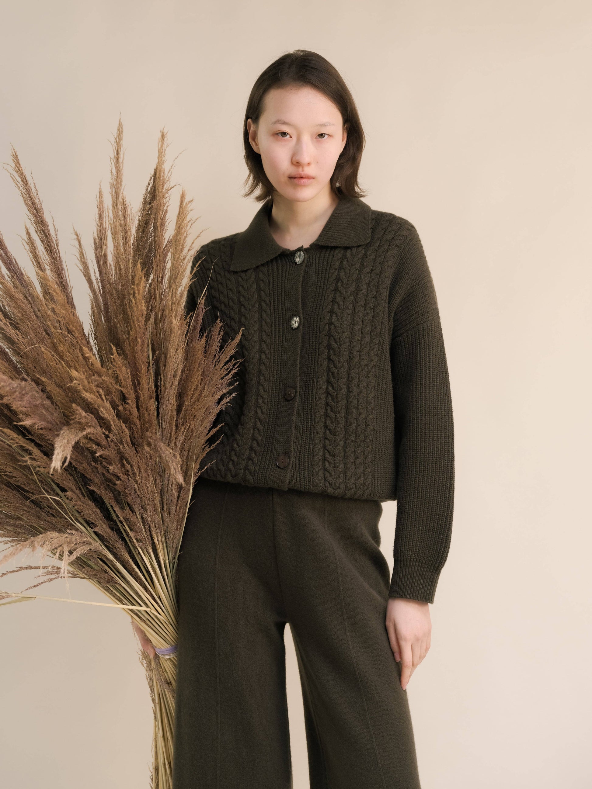 Cardigan polo in misto cashmere con trecce