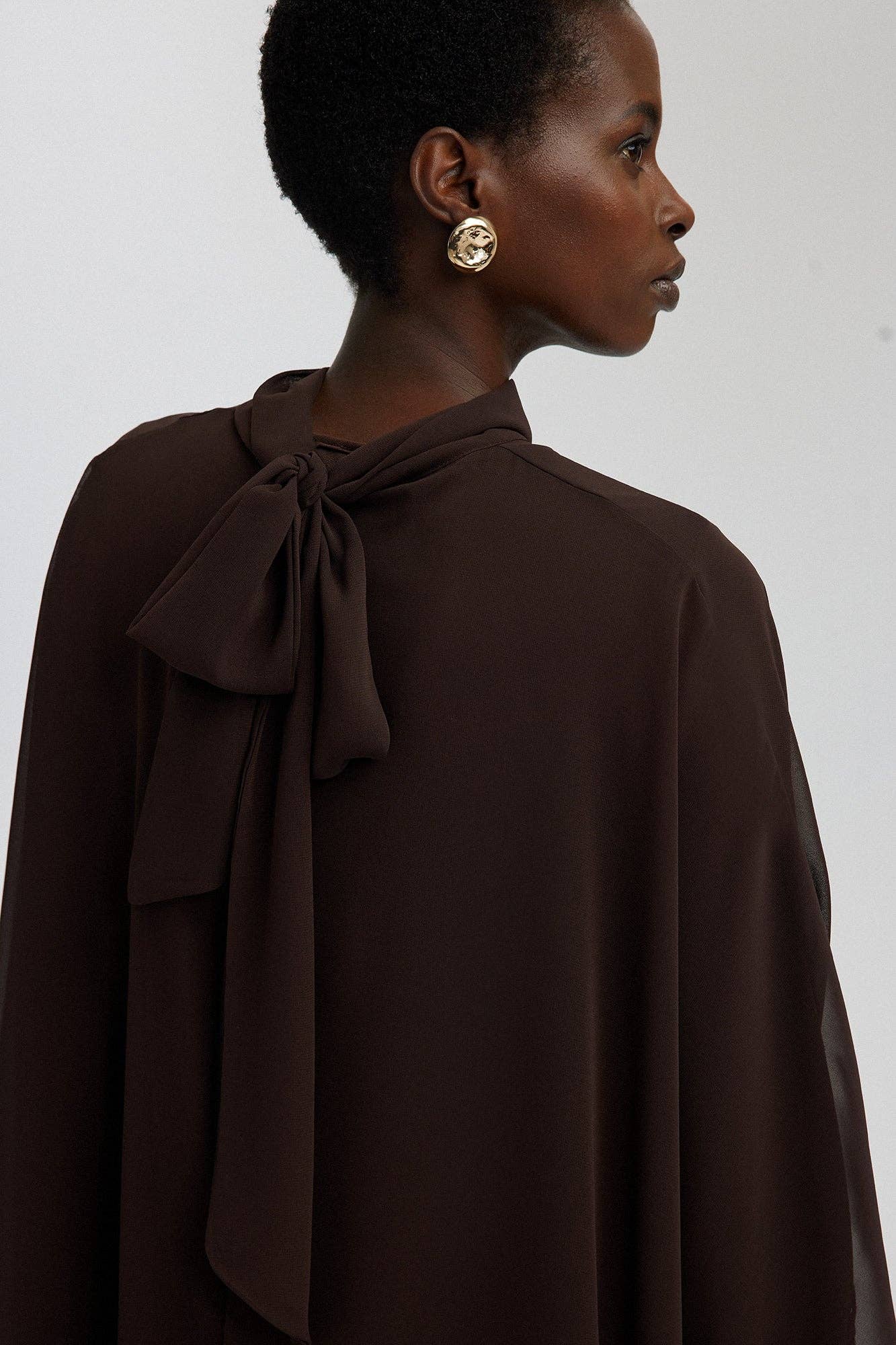 Abito lungo in chiffon con maniche a pipistrello