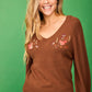 Maglione con scollo a V ricamato beige