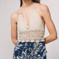 Abito lungo boho con top all’uncinetto e gonna floreale