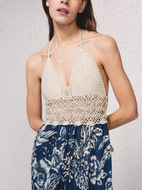 Abito lungo boho con top all’uncinetto e gonna floreale
