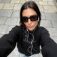 Felpa oversize unisex nera con ricamo Bendita Locura