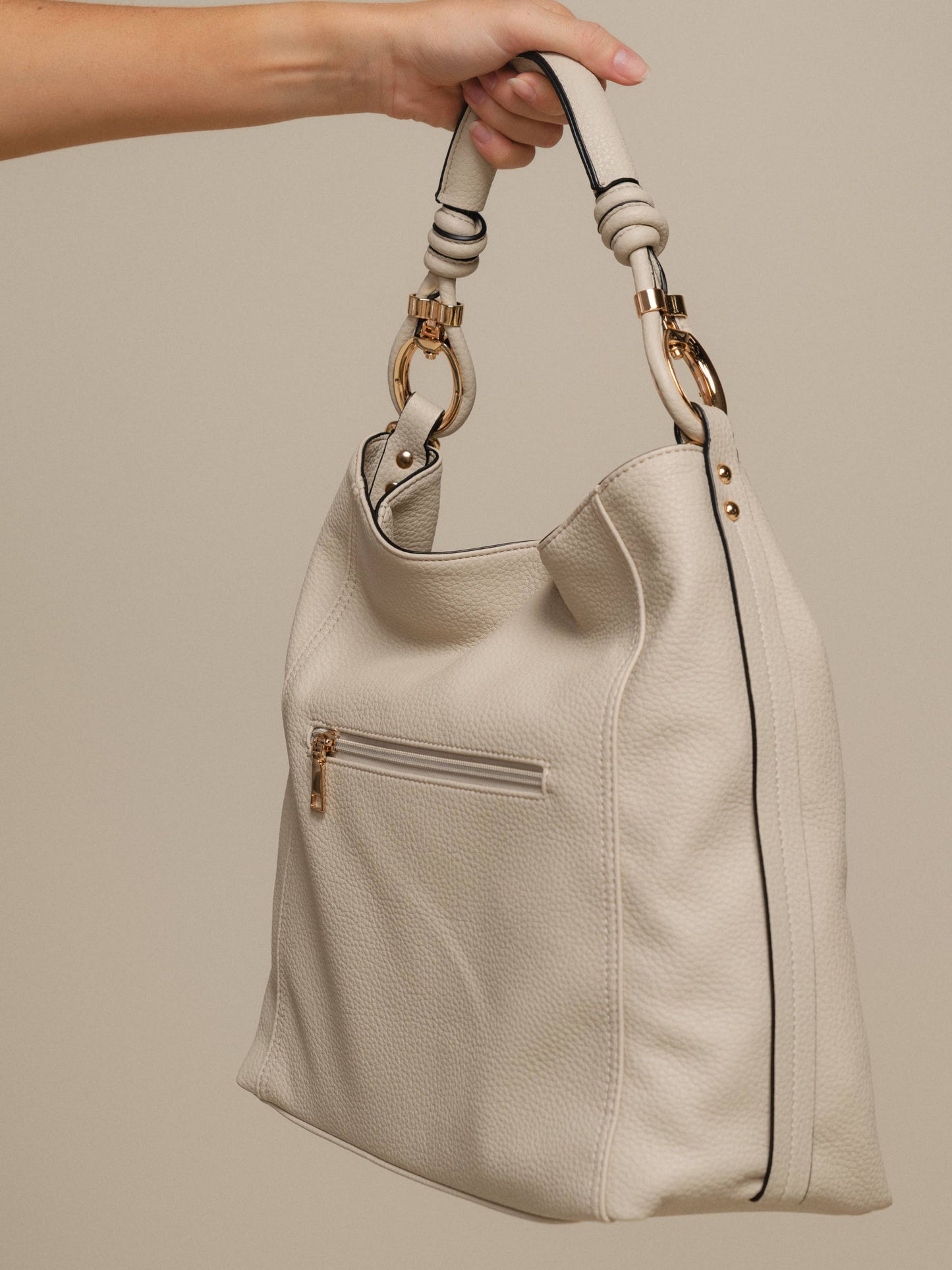 Borsa hobo in ecopelle con manico intrecciato