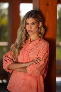 Blusa a righe con volant