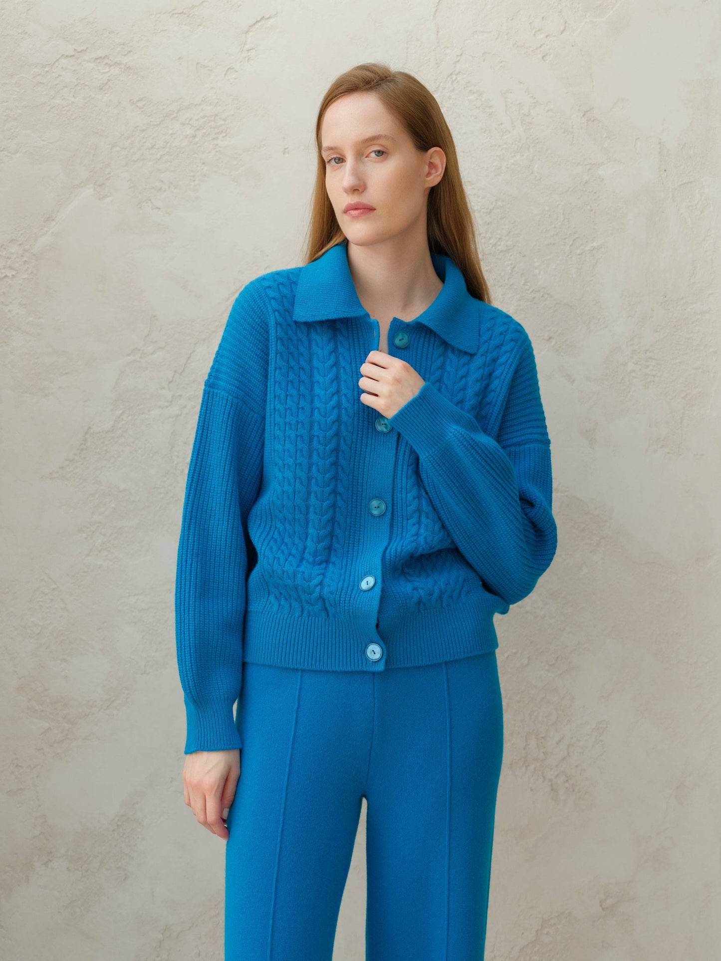Cardigan polo in misto cashmere con trecce