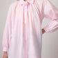 Camicia rosa in cotone con dettaglio floreale