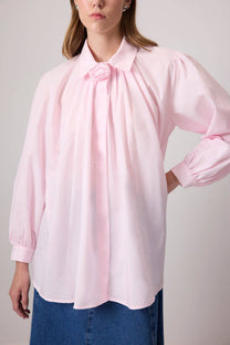 Camicia rosa in cotone con dettaglio floreale