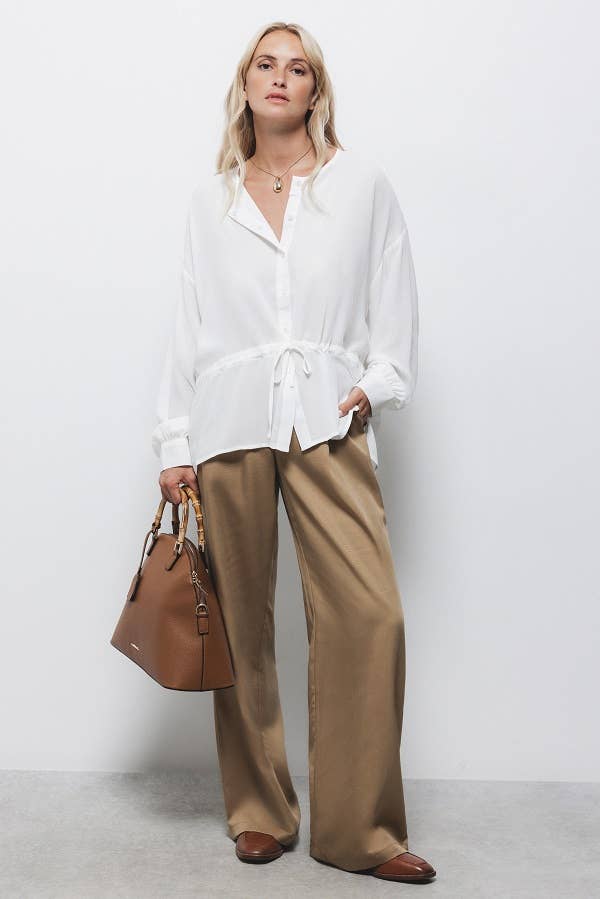 Blusa bianca con coulisse in vita