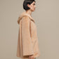 Cappotto in pile con cappuccio e zip
