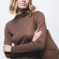 Maglione in maglia con dettagli metallici e collo alto
